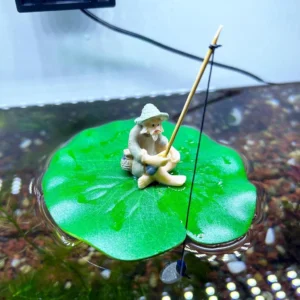 sg-11134201-7repp-m8vpwiqnrritf2.webp Floating Fisherman Aquarium Decoration